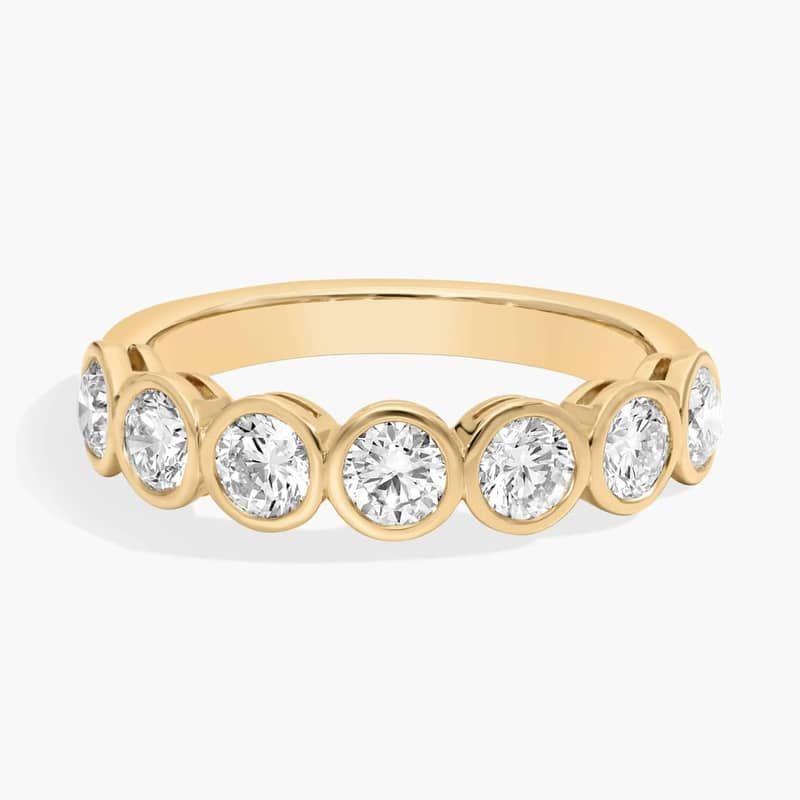 Seven Stone Bezel Anniversary Ring With 1 CTW Round Cut Diamonds in 14K Yellow Gold (4.4mm)