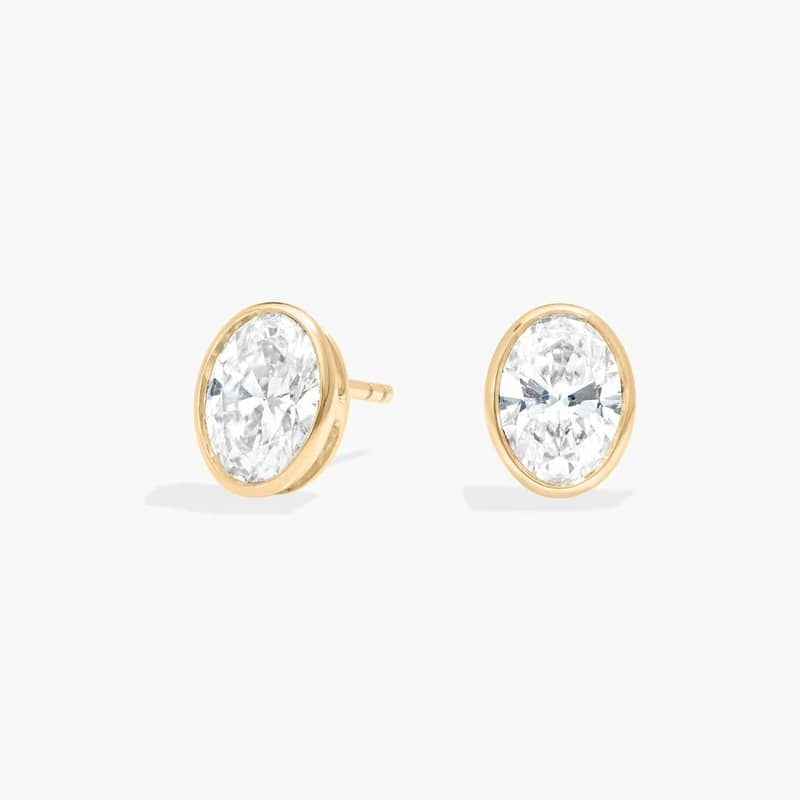 Bezel Stud Earrings With 2 CTW Oval Cut Lab-Grown Diamonds in 14K Yellow Gold