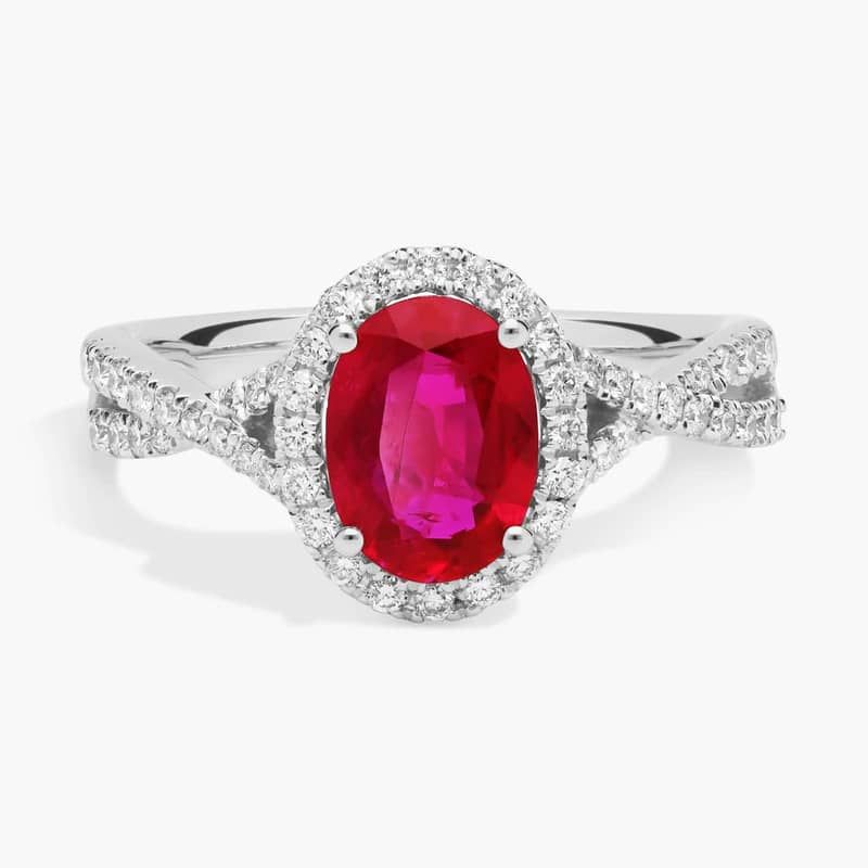 Oval Ruby and Diamond Halo Twist Ring (8x6mm)